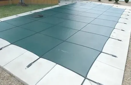 What Is the Difference Between Solid and Mesh Pool Covers?